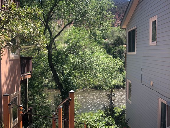 There is a double railing staircase that leads directly to the river.