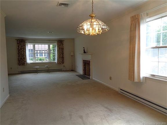 Living room opens to the di...