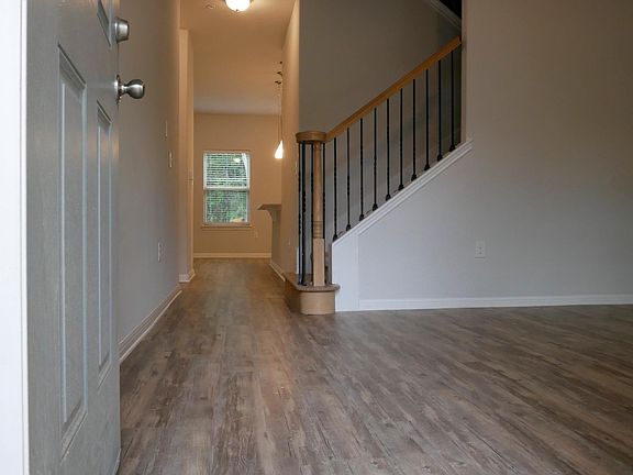 View from entering front door. Showcases the front flex room, possible office, living or dining room.