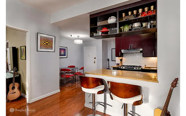 Sold by Douglas Elliman | media 12