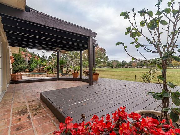 WHAT A VIEW TO COME HOME TO! BOTH COVERED AND UNCOVERED SPACES TO ENJOY.