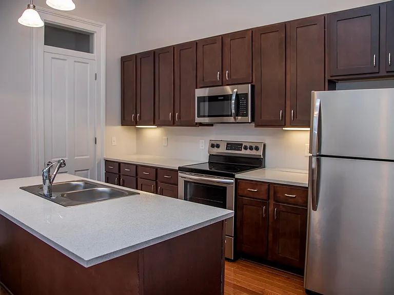 Renovated in 2018, kitchen features stainless appliances, dishwasher and microwave