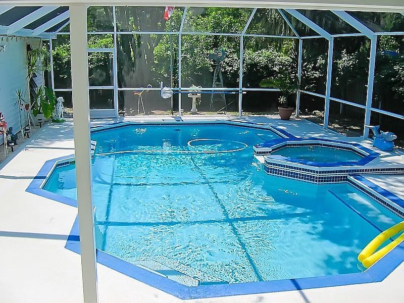 Gorgeous solar heated pool w/ gas heated spillover spa