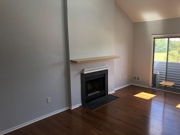 Living Room View 2 - Wood Fireplace