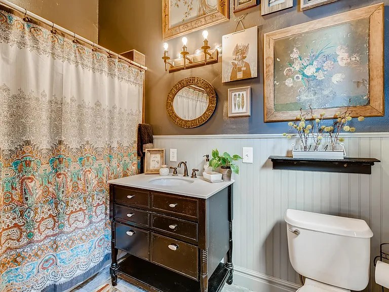 Powder room with soaking tub.