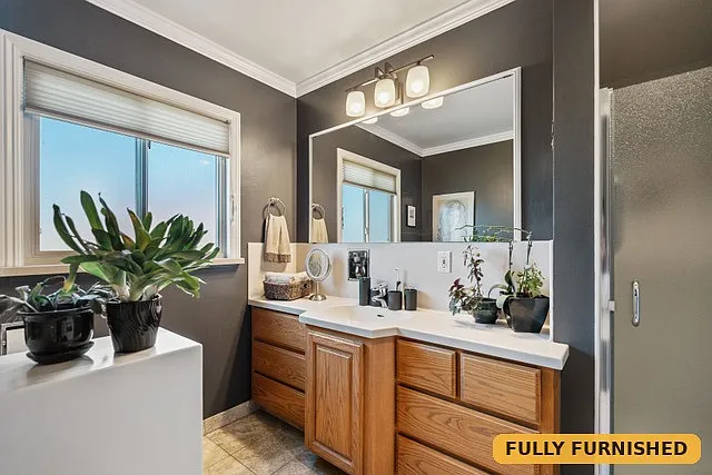 Full bathroom on the main level features a jacuzzi deep soak tub as well as a separate shower stall.