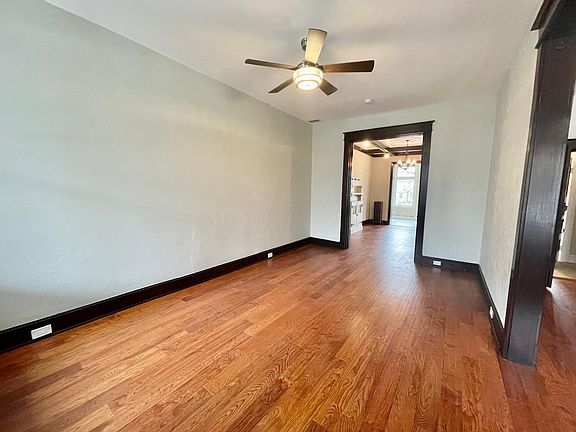 Large Bright Living Room connects to Foyer and Dining Room
