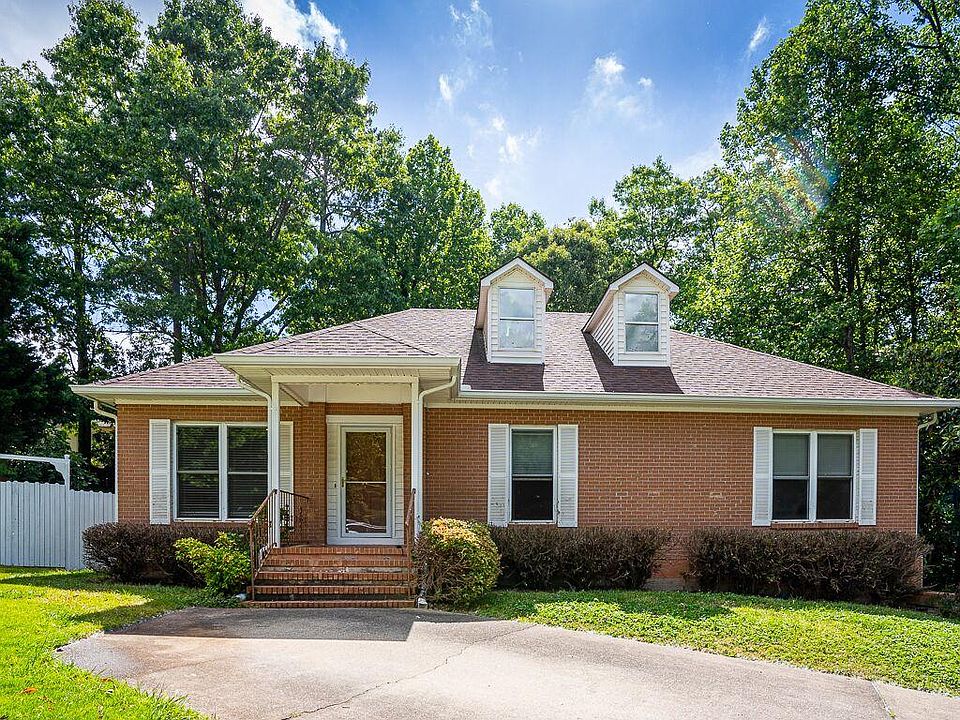 House Front. Driveway includes a parking space for easy front door entry.