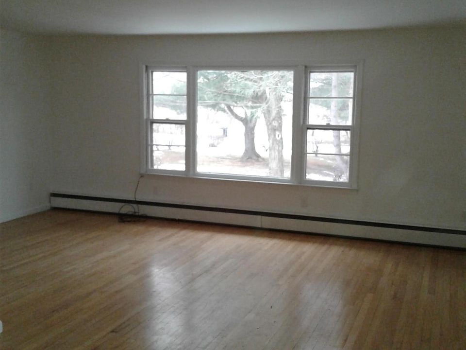 Living room with view of front yard