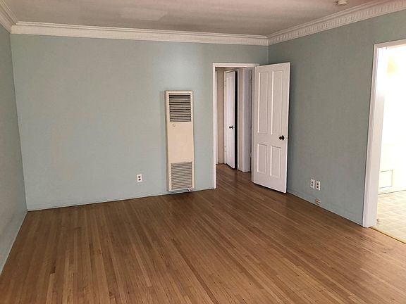 Rest of Living Room with entry to Kitchen