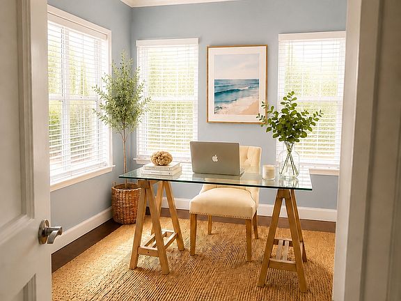 Downstairs bedroom/office space perfect for working or grandparents/guests separate from upstairs living spaces. Virtual staging - no furniture included.