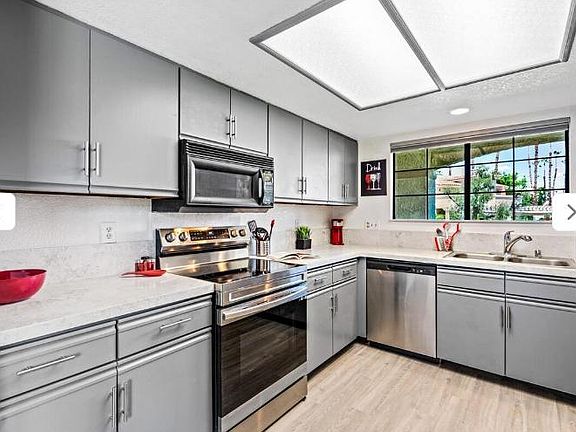 Kitchen with convection stove, microwave, dishwasher