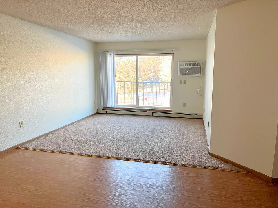 Living Room - 2 & 3 Bedroom Units w/ Balcony or Patio