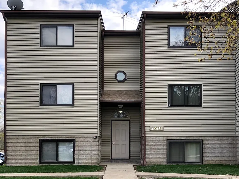 The building at 2601 Westwinds Drive. Unit 2 is the top right window.