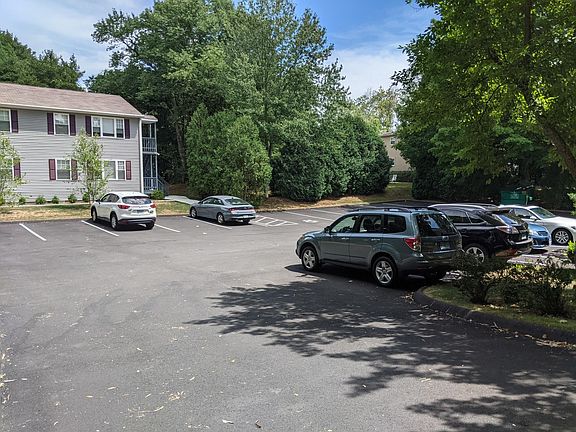 Parking lot with plenty of spaces. Newly paved
