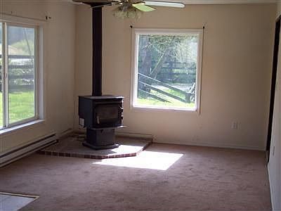 Heat saving wood stove will keep this home warm.