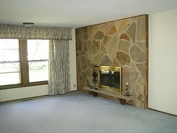 Fireplace in large living room.