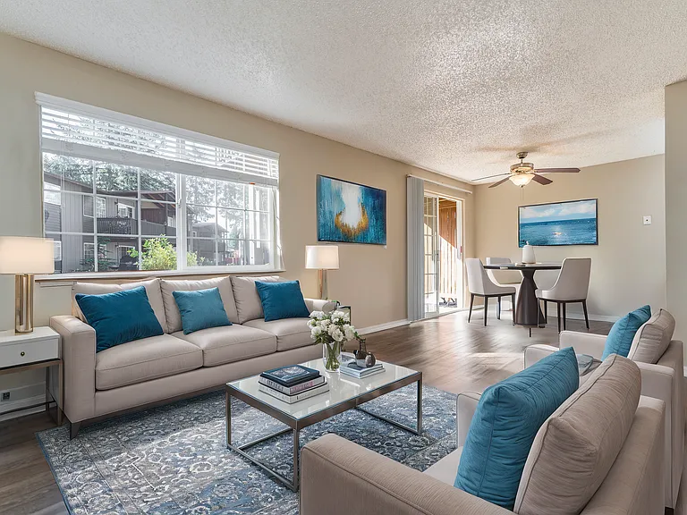 Experience the warmth of this beautifully designed living space complemented by an inviting dining area. Experience the warmth of this beautifully designed living space complemented by an inviting dining area.