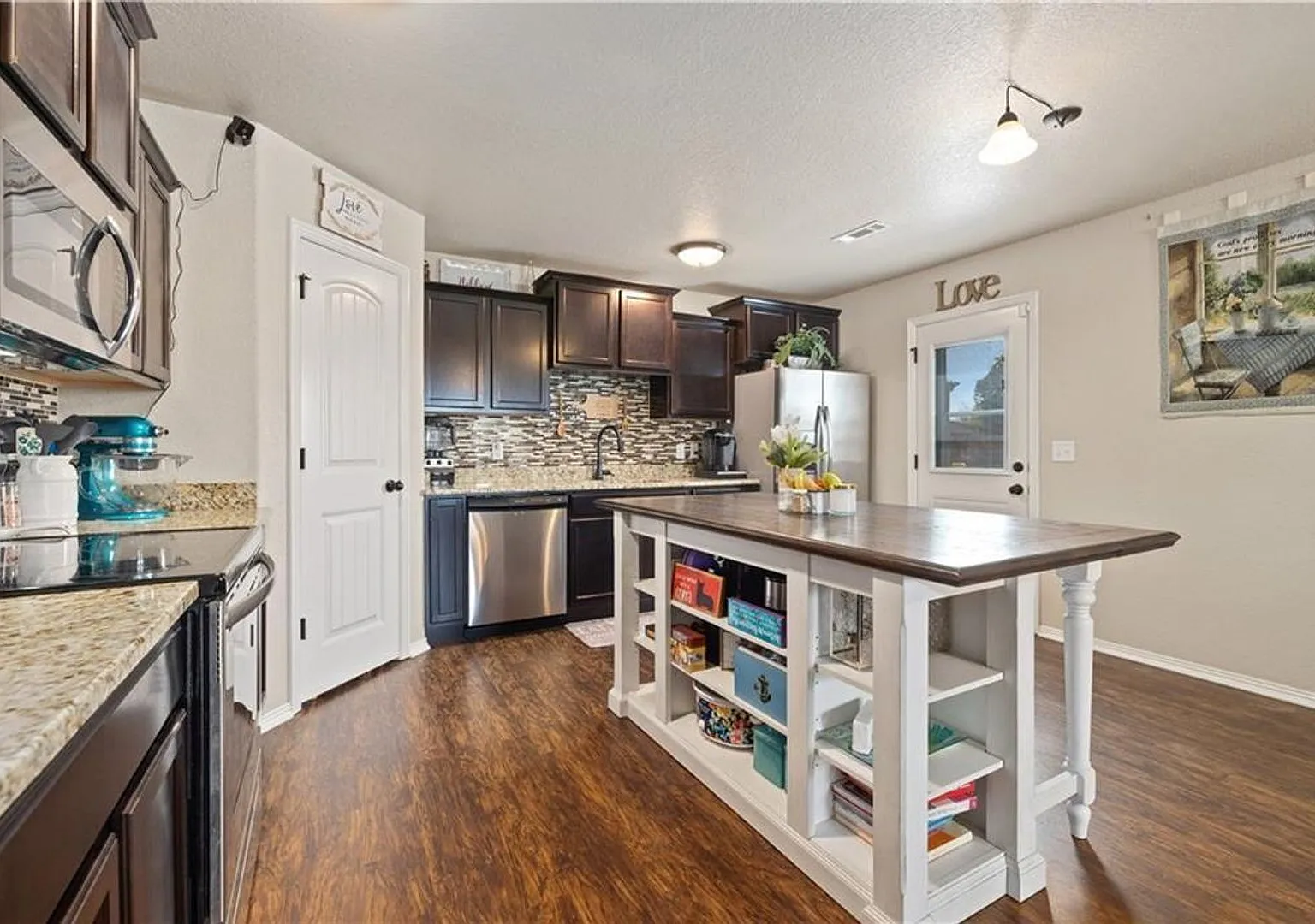 well-kept 3-bedroom, 2-bathroom home — Photo 1