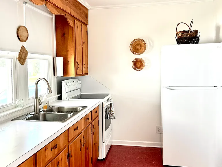 Kitchen with brand new LG refrigerato