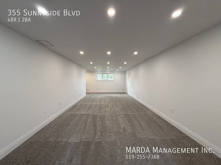 355 Sunnyside Blvd — Photo 45