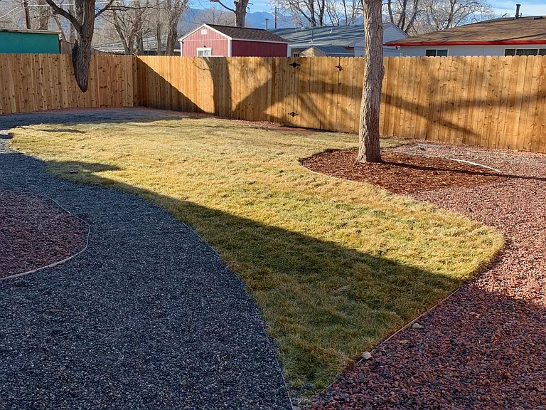Spacious Backyard Complete with Lawn and Sprinkler System