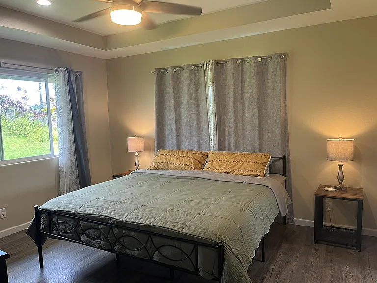 Primary suite featuring an ensuite bath and walk-in closet
