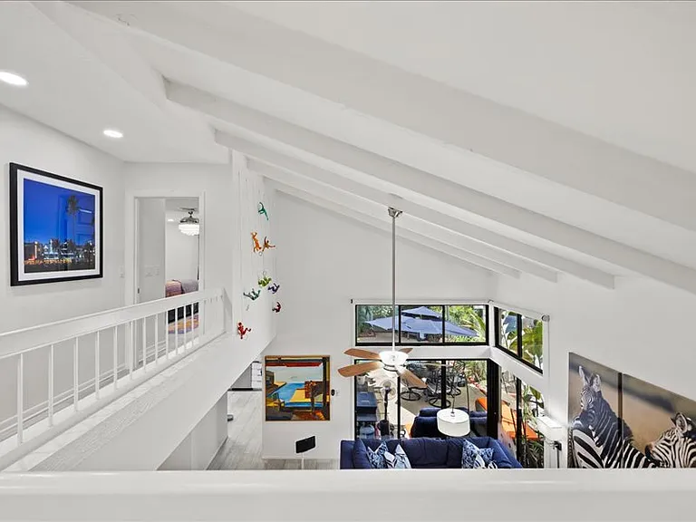 View of living room and backyard from hallway.