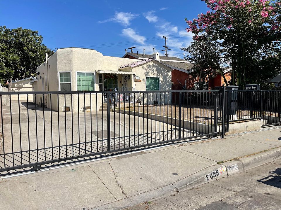 Front of property with parking available. (Available unit is located in the back of property)