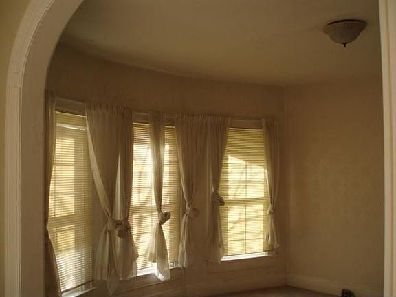 Bay window & arched doorway