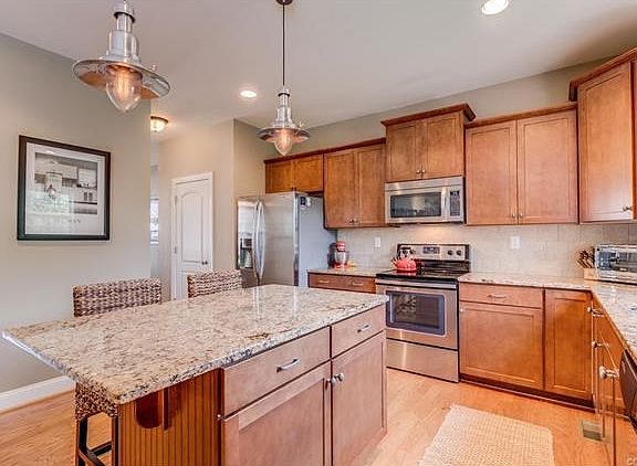 Granite island with breakfast bar...