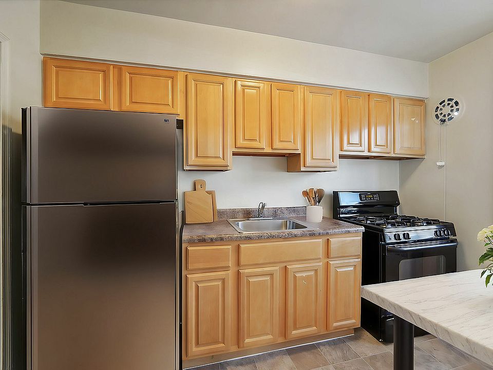 Explore this elegantly designed kitchen featuring premium finishes and ample storage.