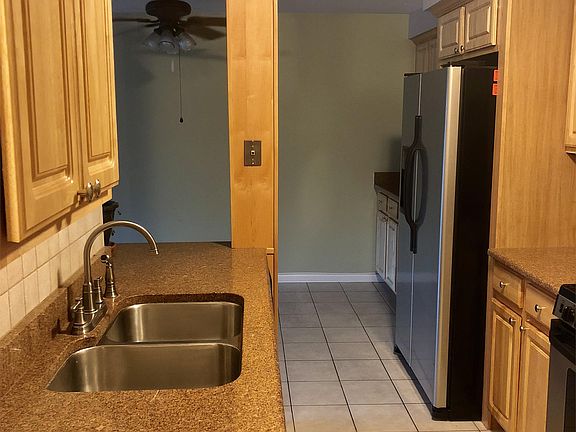 Granite countertops and SS appliances.
