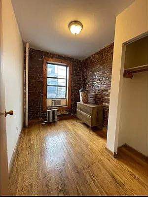 3rd image of 202 E 7th St APT 3D