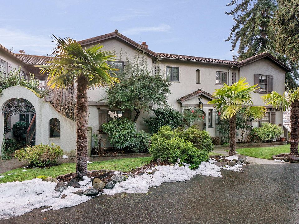 Courtyard with circular driveway with limited reserved parking.