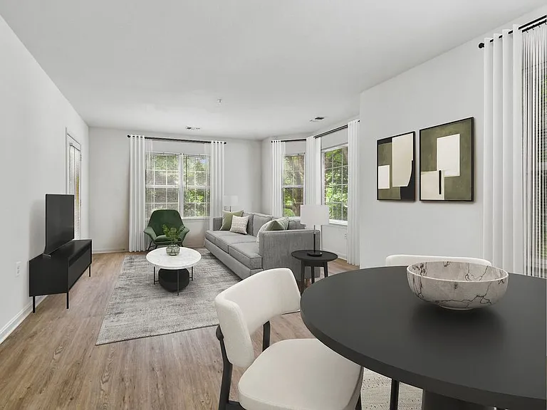 Renovated Package I living and dining area with hard surface flooring