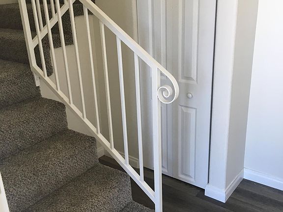 Foyer with Closet under stairs