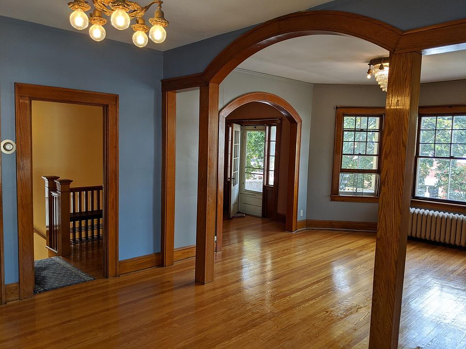 Open floor plan between Dining and Living Room. Bonus room with access to porch. Closet in stairwell.