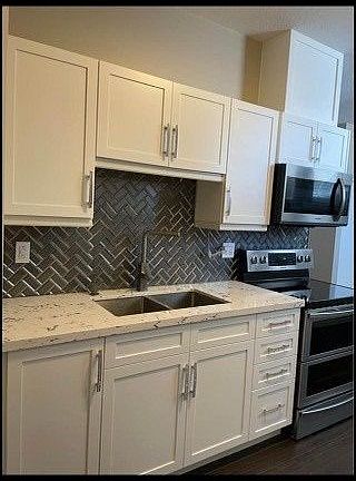 2nd image of 111 Main St E #105