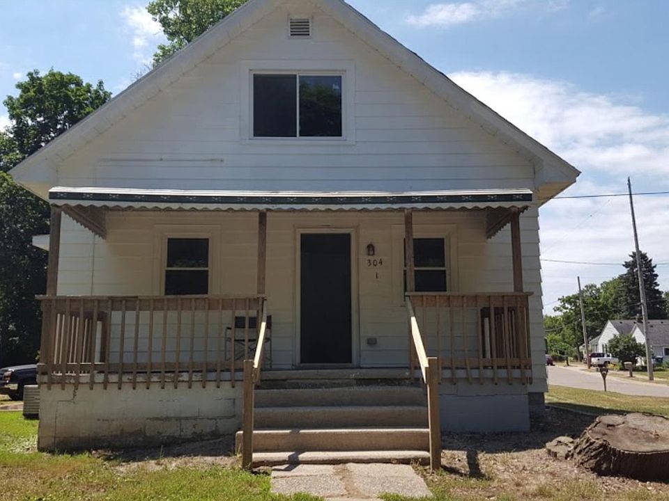Spacious covered porch with a view of Gier Park