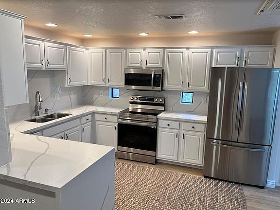 2nd image of 9555 E RAINTREE Drive #1016