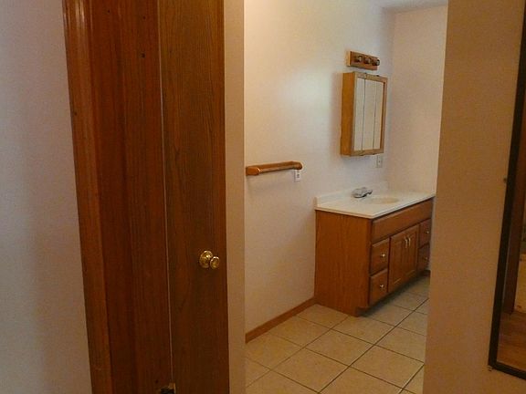 Large bathroom with linen closet
