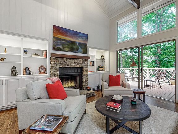 Great room with fireplace and deck access.