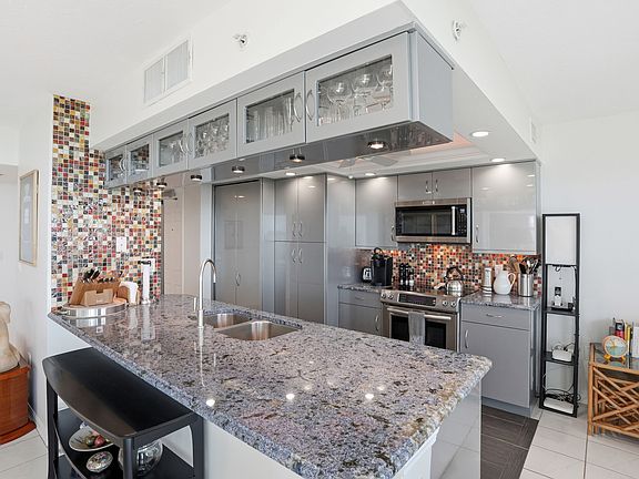 3rd image of 6101 Pelican Bay Blvd Penthouse 1