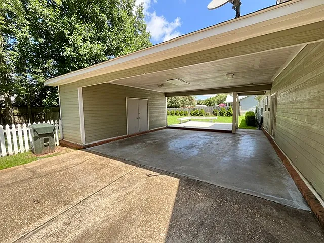 2 car covered parking and large walk-in storage closet