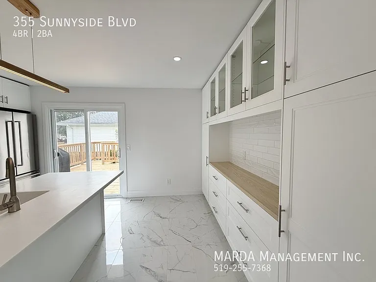 355 Sunnyside Blvd — Photo 12