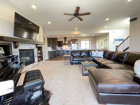 Gas fireplace for those cozy movie night while able to grab popcorn from the kitchen nearby