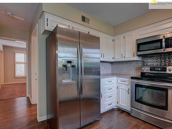 Hardwoods in Kitchen and Refrigerator Stays!