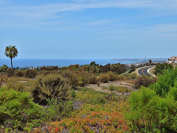 Enjoy views of the ocean, Dana Point Harbor, Catalina Island, sunsets, and greenbelt open space.