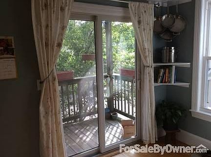 Back deck off of kitchen
						:
						Lovely back deck with access to lower level through separate staircase.
